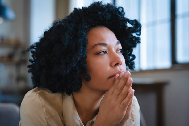 A woman in quiet reflection